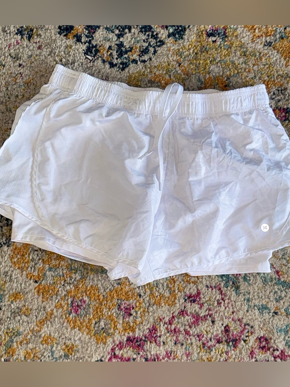 Women’s large Reebok white running shorts